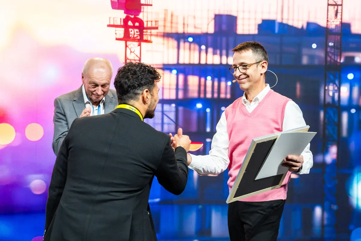 Award presentation on stage